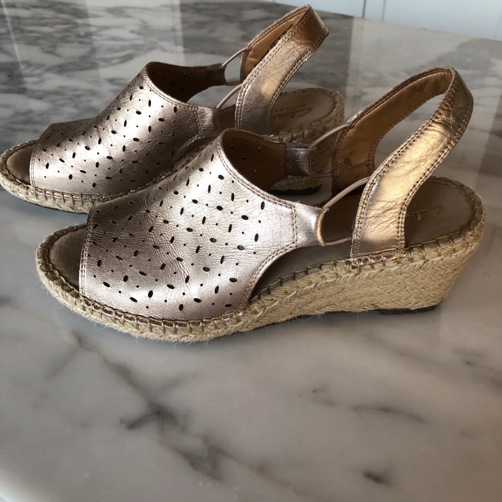 Gold espadrilles - very nice shoes  heel is 2 1/2” worn once. CLARKS.